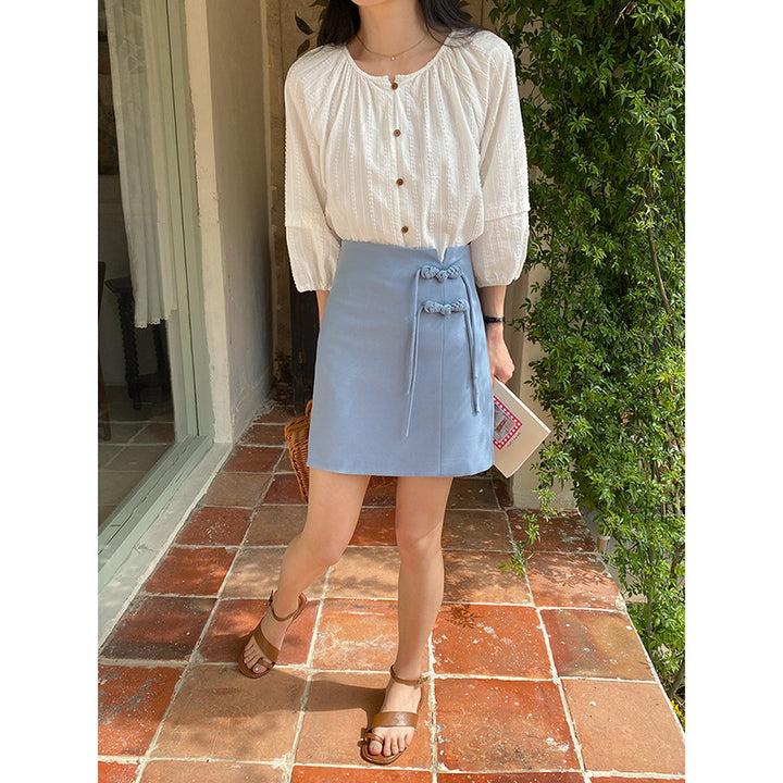 Women's elegant wrap skirt with decorative button details Chic & Stil