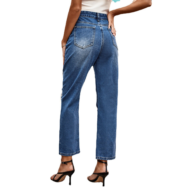 Women’s relaxed fit jeans with ripped elements and high waist Lune London