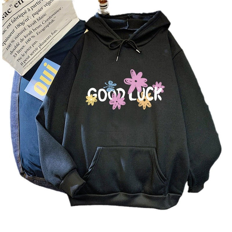 Women's hoodie with cheerful design and printed lettering Chic & Stil