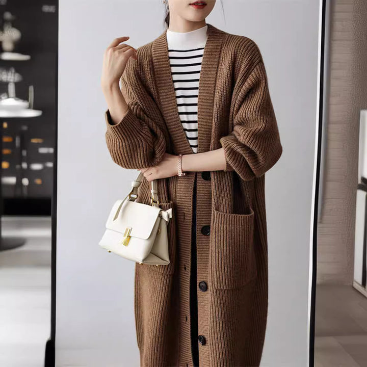 Knit coat for women with practical side pockets and elegant button details Lune London