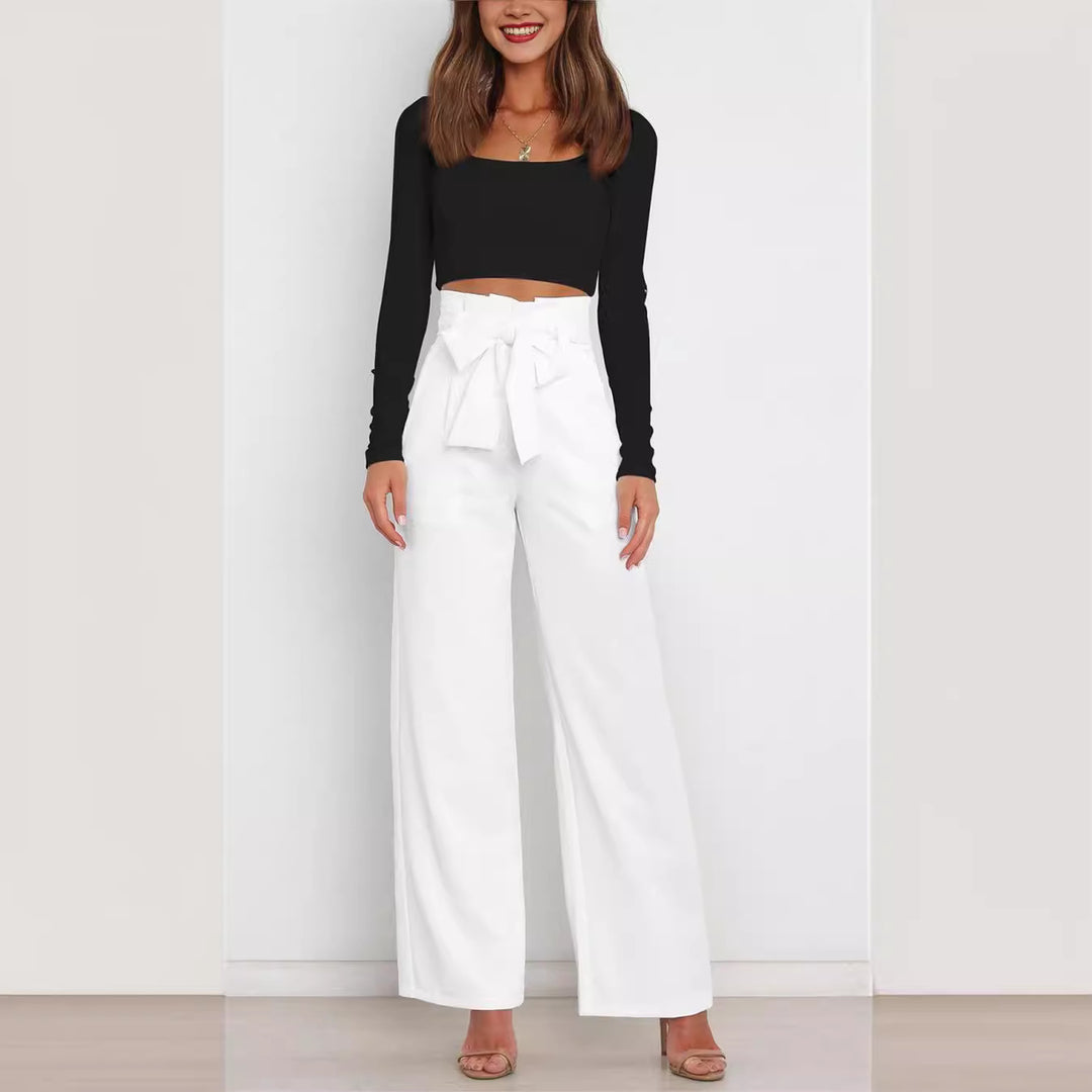 Wide fabric trousers for women with a tie belt and stylish pockets Lune London
