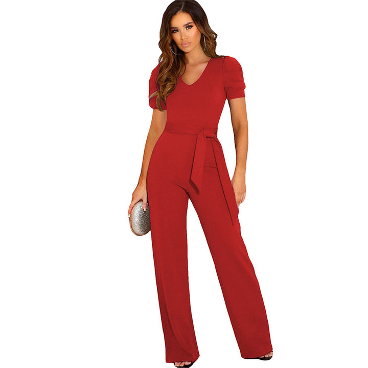 Elegant women's jumpsuit with waist belt and puff sleeves Lune London