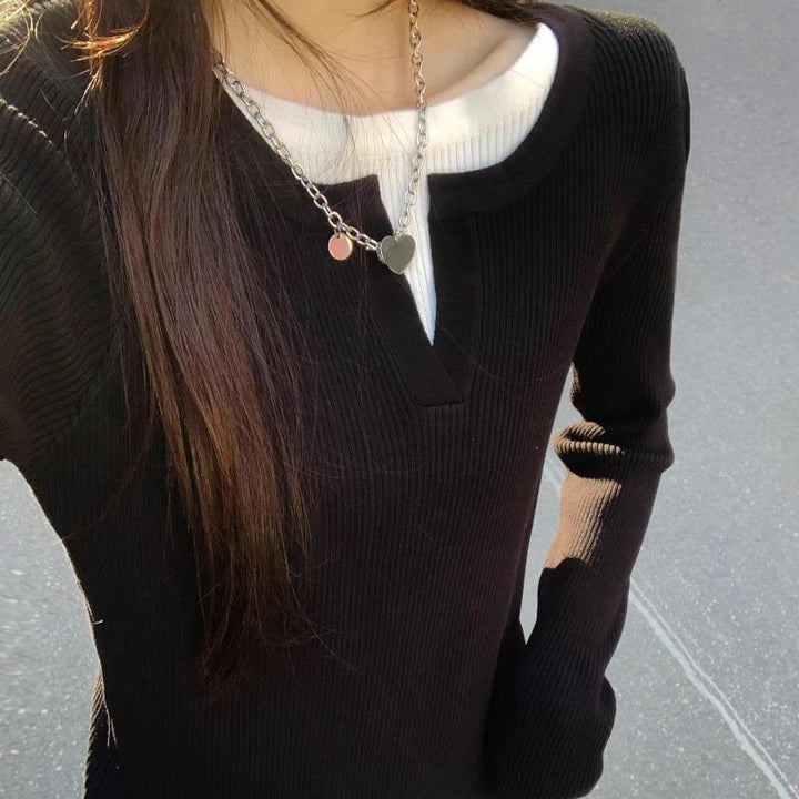 Pull léger en maille fine pour femmes avec col en V et structure côtelée Chic & Stil