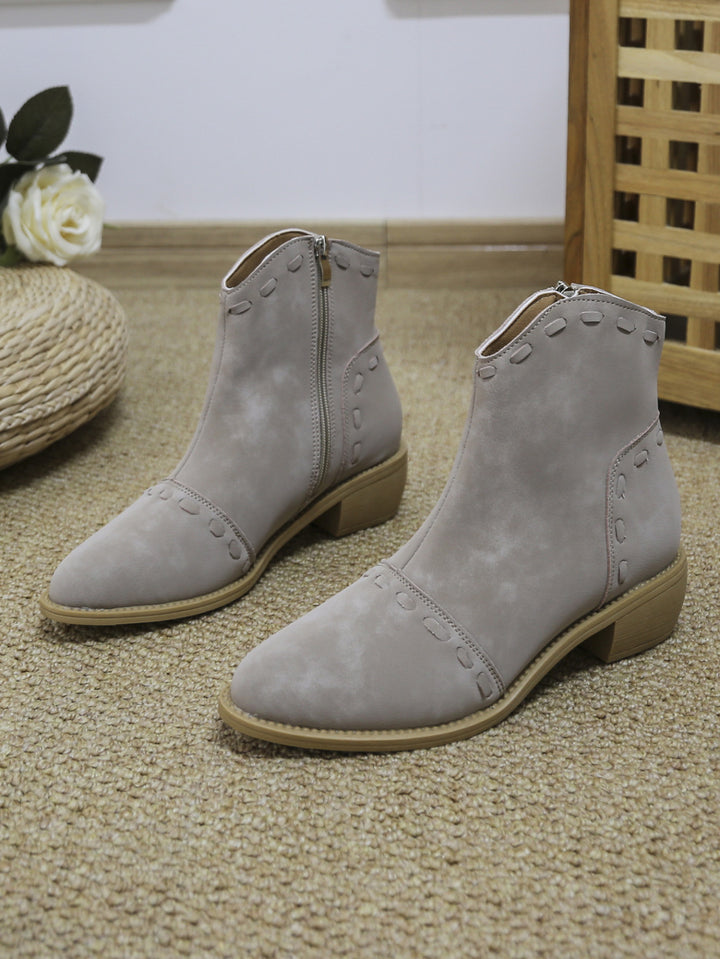 Elegant ankle boots for women with trendy decorative stitching and a practical zipper Lune London