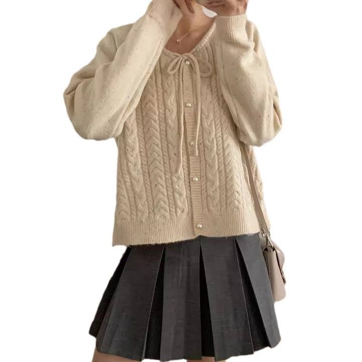 Chunky knit jacket for women with elegant pearl buttons and a structured design Lune London