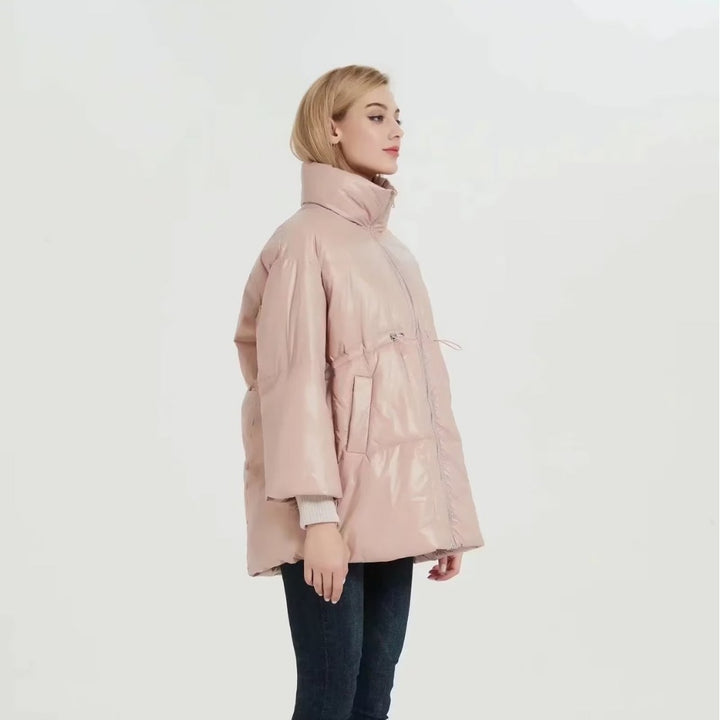 Quilted transition jacket for women with high collar and practical side pockets Lune London