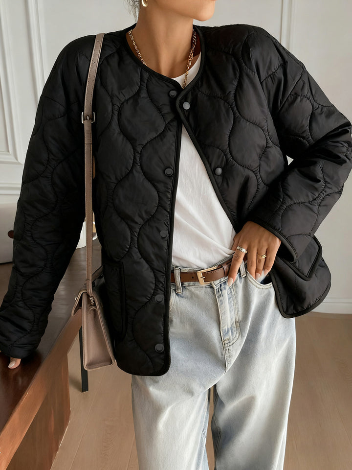 Veste matelassée pour femmes au design moderne et aux poches pratiques Chic & Stil