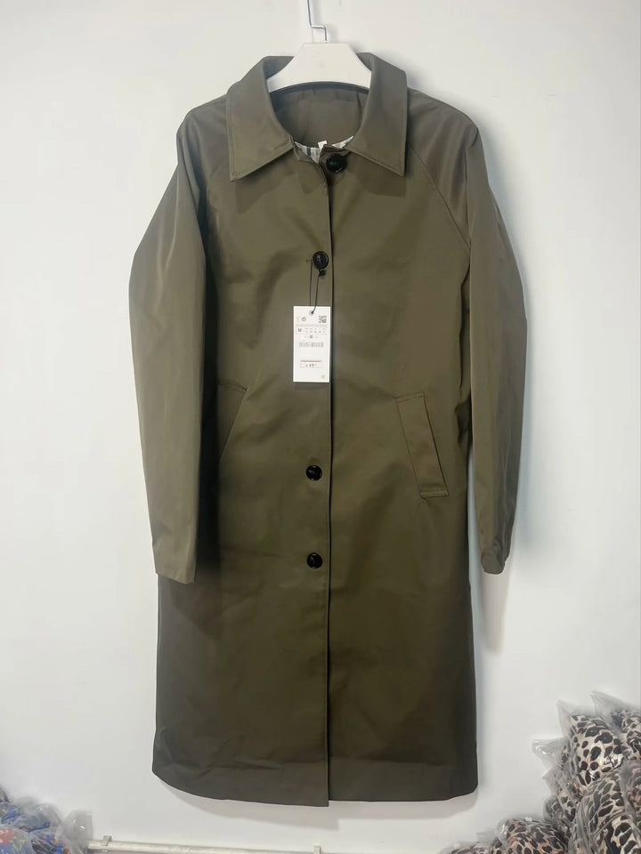 Transitional jacket for women with elegant high collar and practical button details Lune London