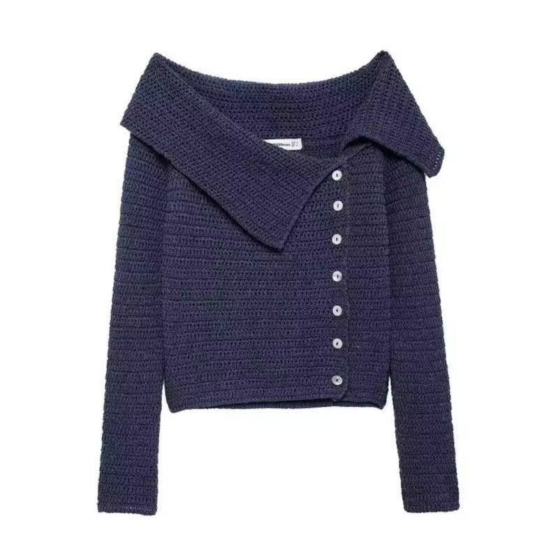 Elegant women's knitted vest with a deep collar and chic button details and style