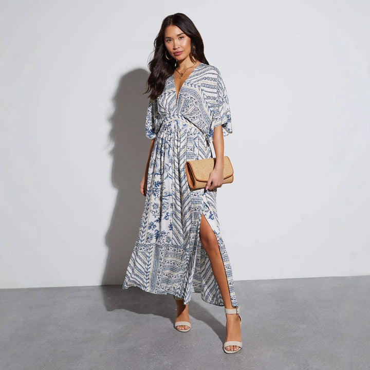 Women's maxi dress with exciting wrap design and voluminous sleeves