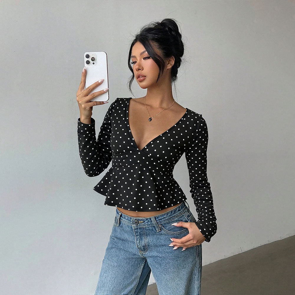 Chemisier pour femmes avec coupe peplum et motif à pois Chic & Stil