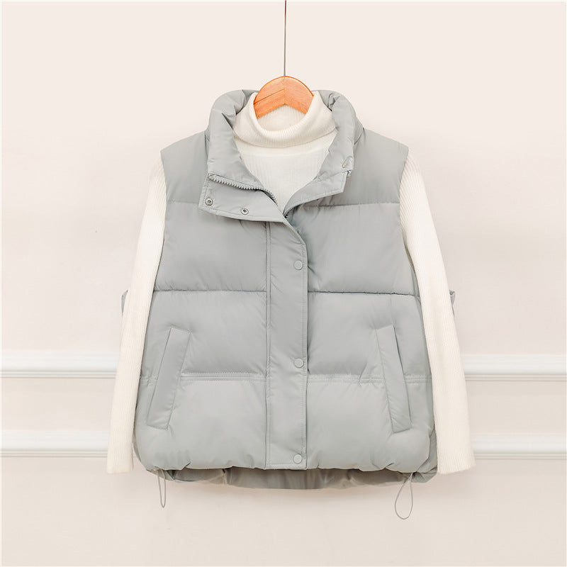 Sporty quilted vest for women with high collar and practical pockets Lune London