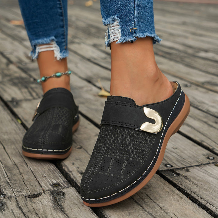 Women Breathable Clogs with trendy perforations and an adjustable strap Lune London