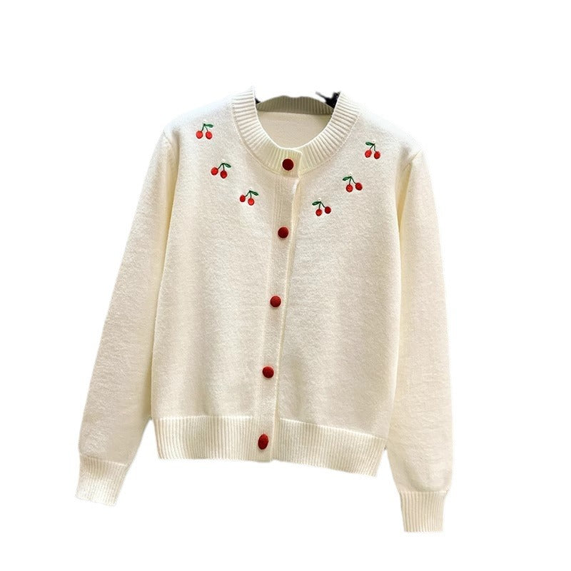 Ladies playful cardigan with embroidered cherries and red buttons Lune London