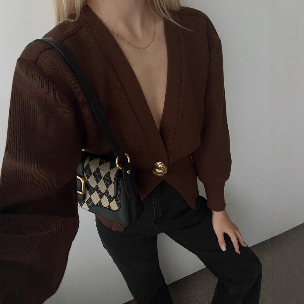 Women's fashion knitted cardigan with deep V-neck and decorative button Lune London
