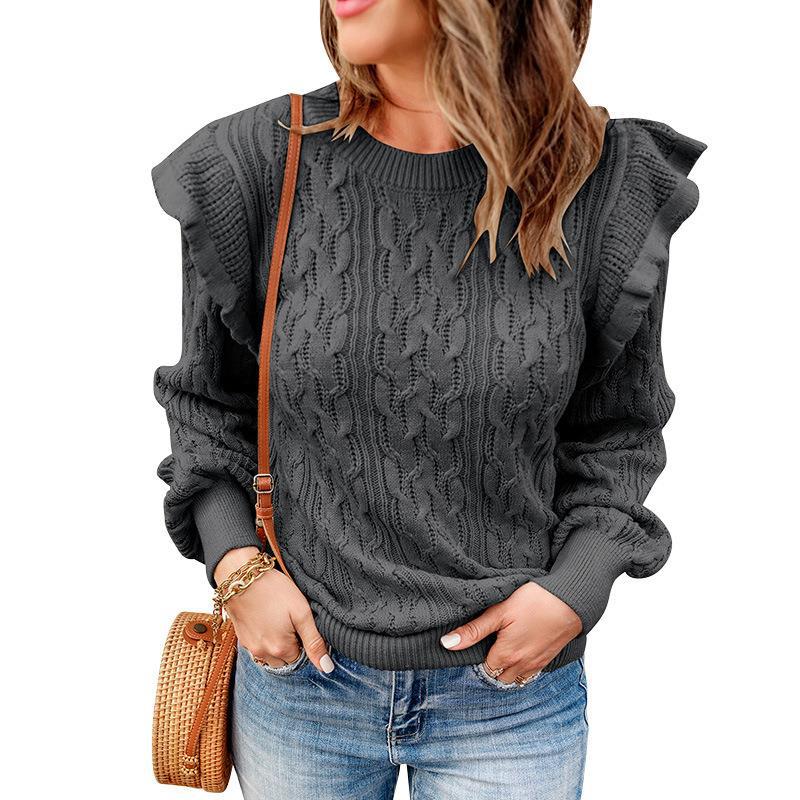 Women's loose knit sweater with ruffled columns and a trendy Lune London pattern