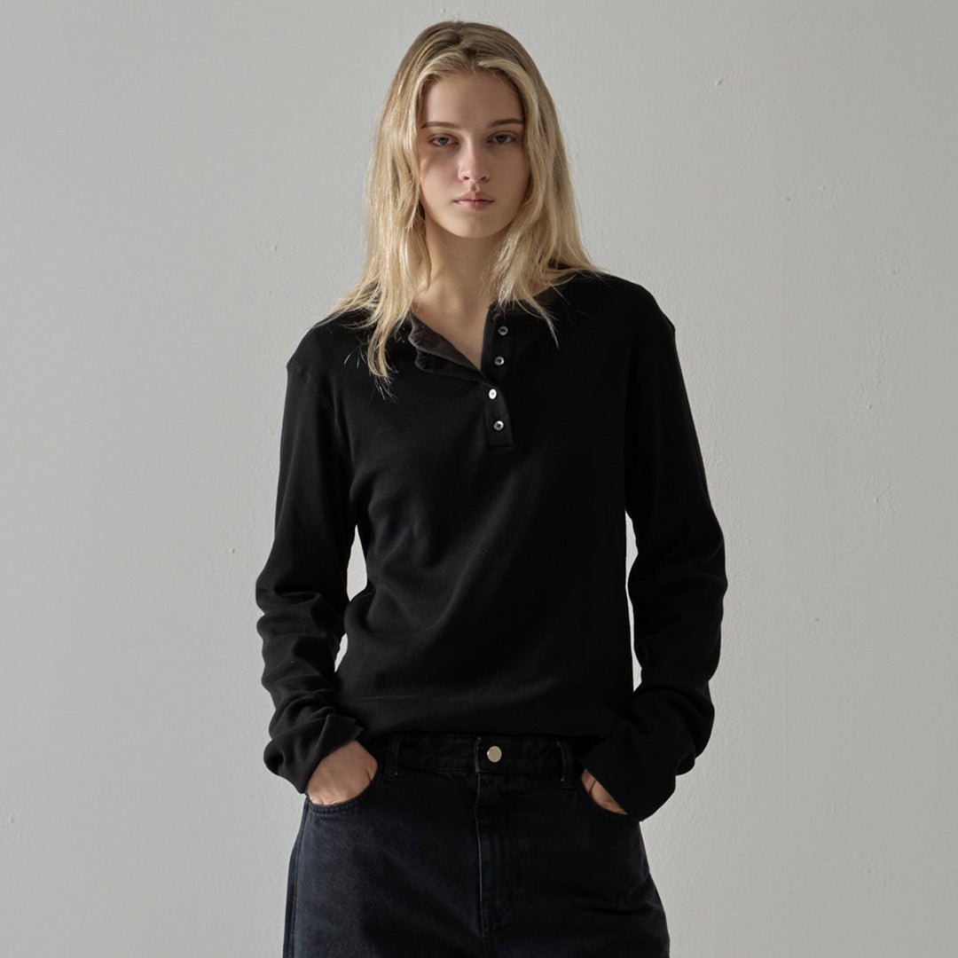 Knitted tank top for women with asymmetric button closure and long sleeve cuffs Lune London
