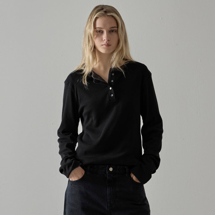 Knitted tank top for women with asymmetric button closure and long sleeve cuffs Lune London