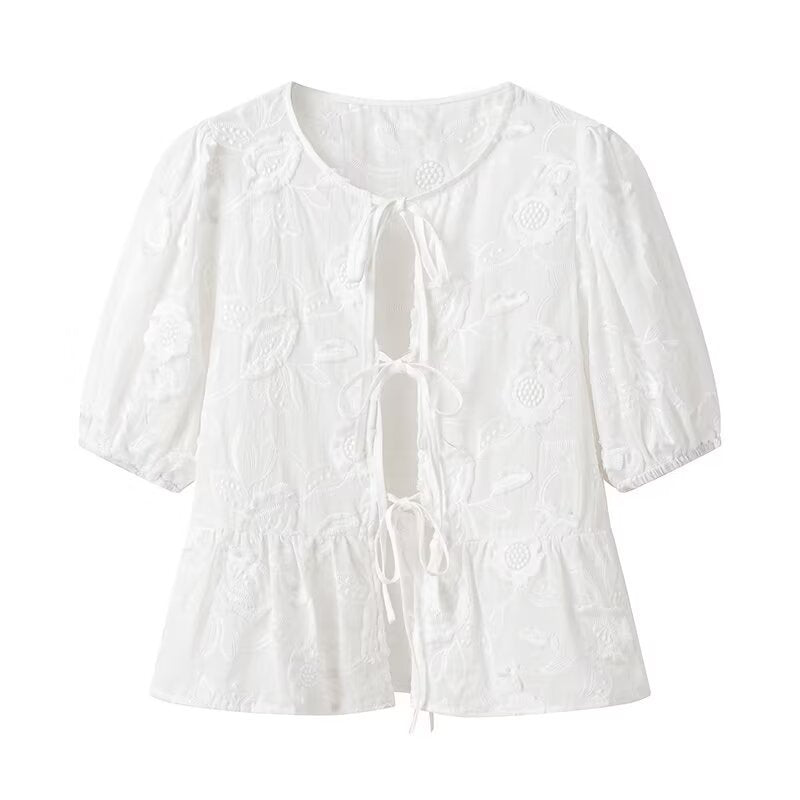 Women's blouse with embroidered floral pattern and romantic ruffle details Lune London