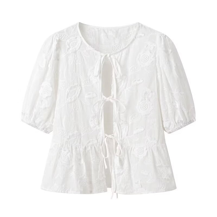 Women's blouse with embroidered floral pattern and romantic ruffle details Lune London