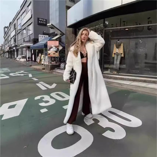Oversized faux fur coat for women with hood and textured design Lune London