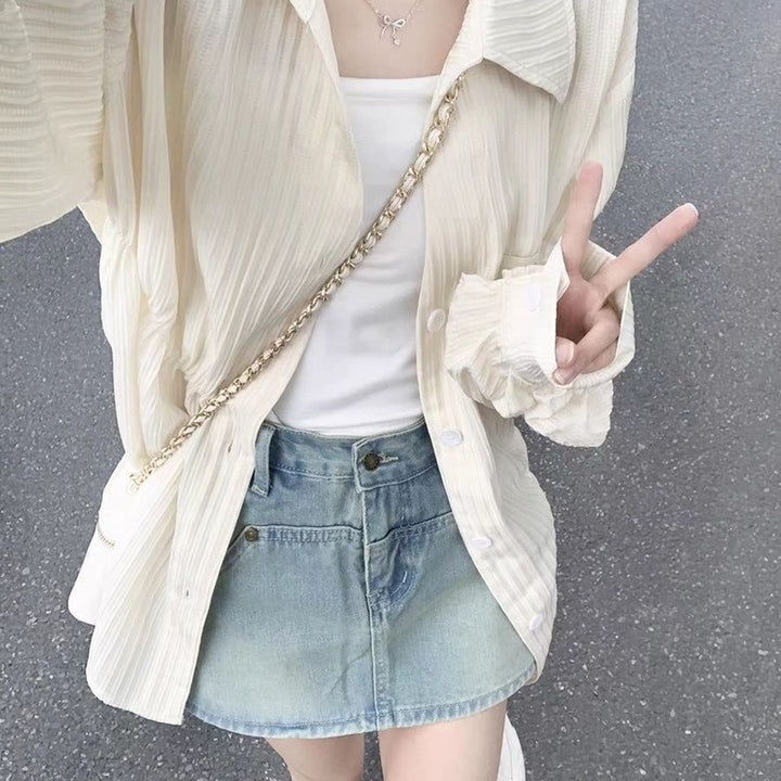 Women casual long sleeve blouse with textured fabric and stylish accents Lune London