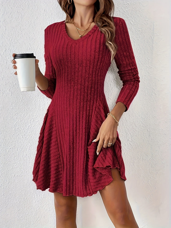 V neck dress for women with flared hem and long sleeves Lune London