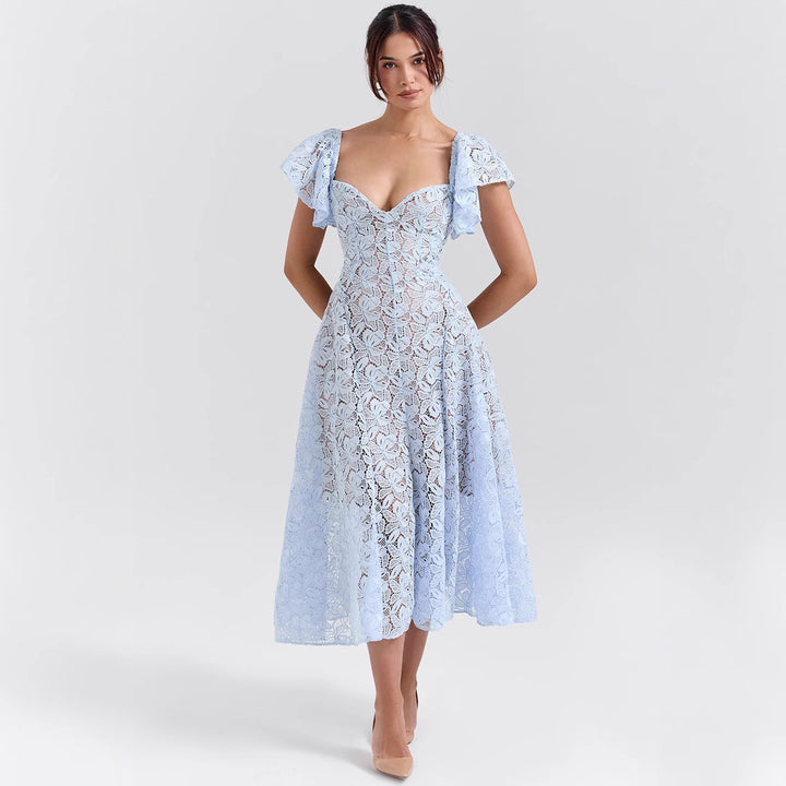 Maxi lace dress for women with voluminous ruffles and a subtle heart-shaped neckline Chic & Stil