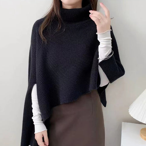 Ladies knitted poncho with high collar and elegant ribbed texture Lune London