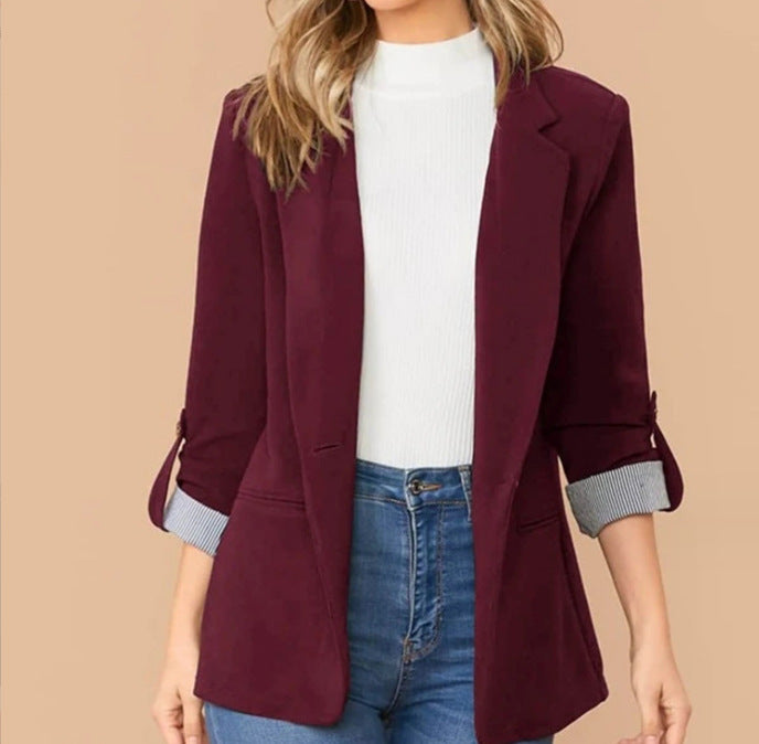 Fashionable women's blazer with roll-up sleeves and textured details Lune London