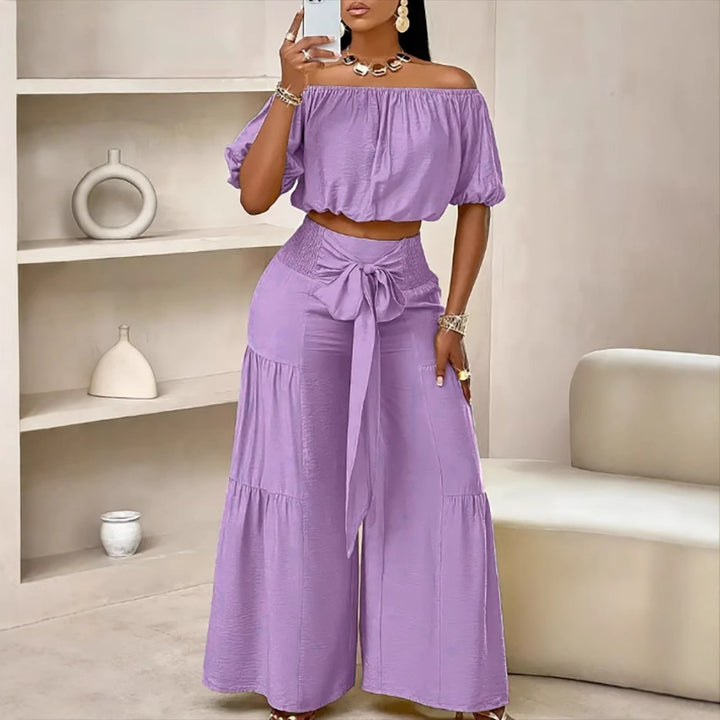 Woman Deep V-Neck Crop Top and High-Waisted Palazzo Pants Lune London