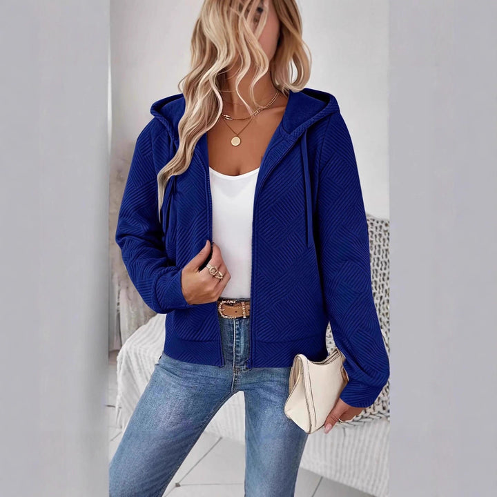 Veste à capuche sportive pour femmes avec design texturé et poches pratiques Chic & Stil