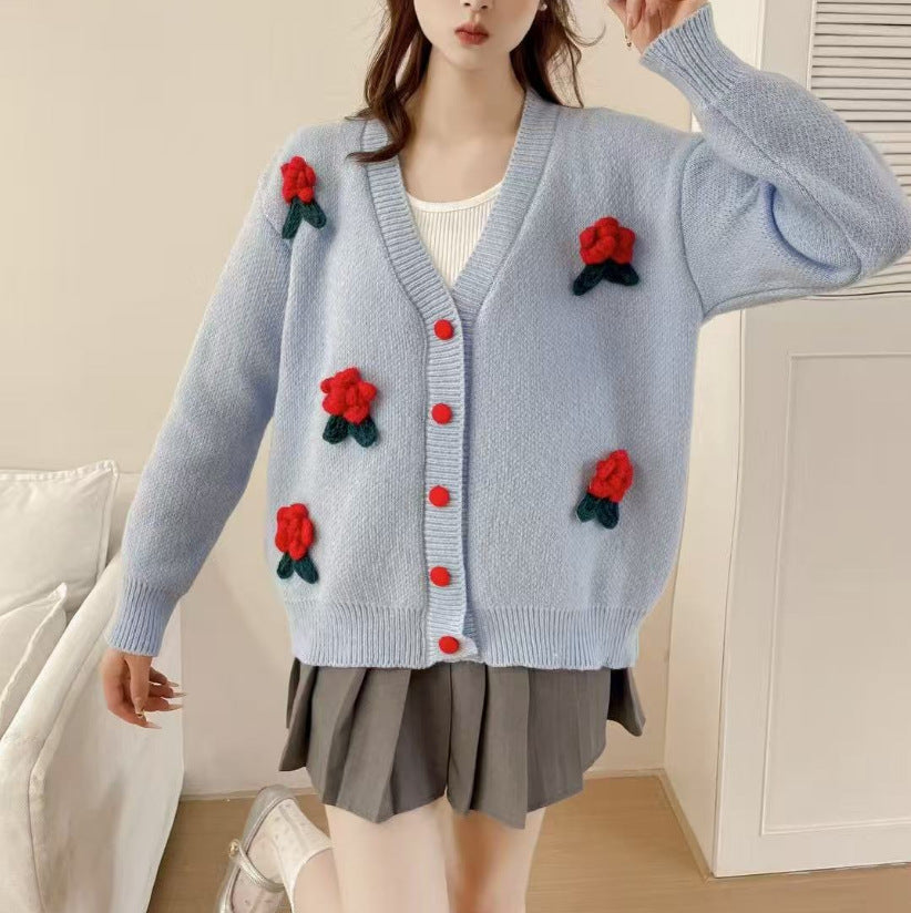 Femmes cardigan ludique en tricot avec des appliques florales et des détails de boutons Lune London