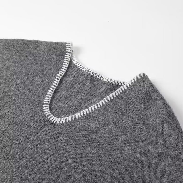 Pull en tricot épais pour femmes avec col en V profond et poches pratiques Chic & Stil