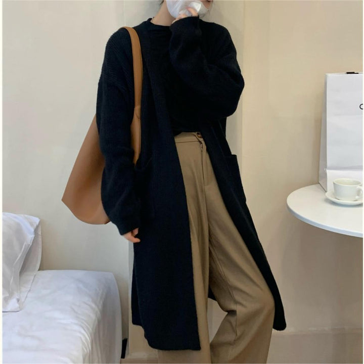 Manteau tricoté pour femmes avec ouvertures et poches spacieuses Chic & Stil