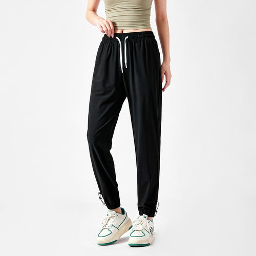 Light sport pants for women with elastic waist and practical pockets Lune London