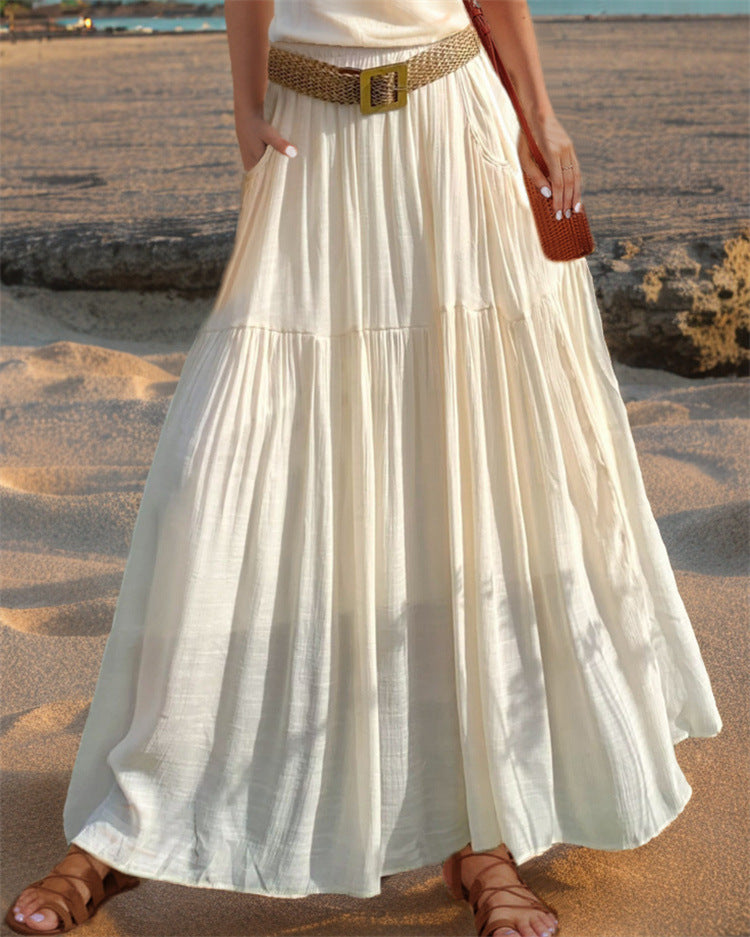 Maxi flared skirt for women with elegant pleated draping and practical pockets Lune London