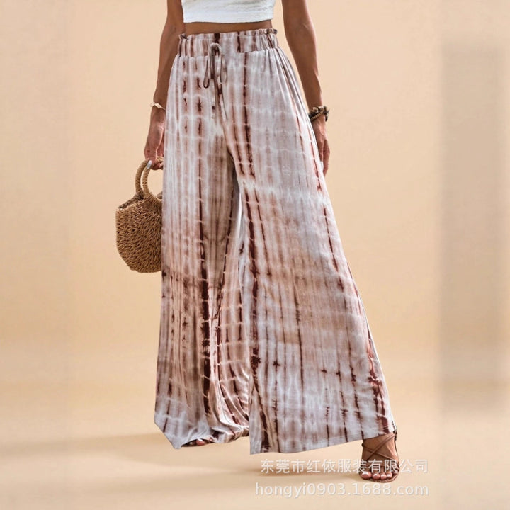 Pantalon d'été ample pour femmes avec taille élastique et motif batik unique Chic & Stil