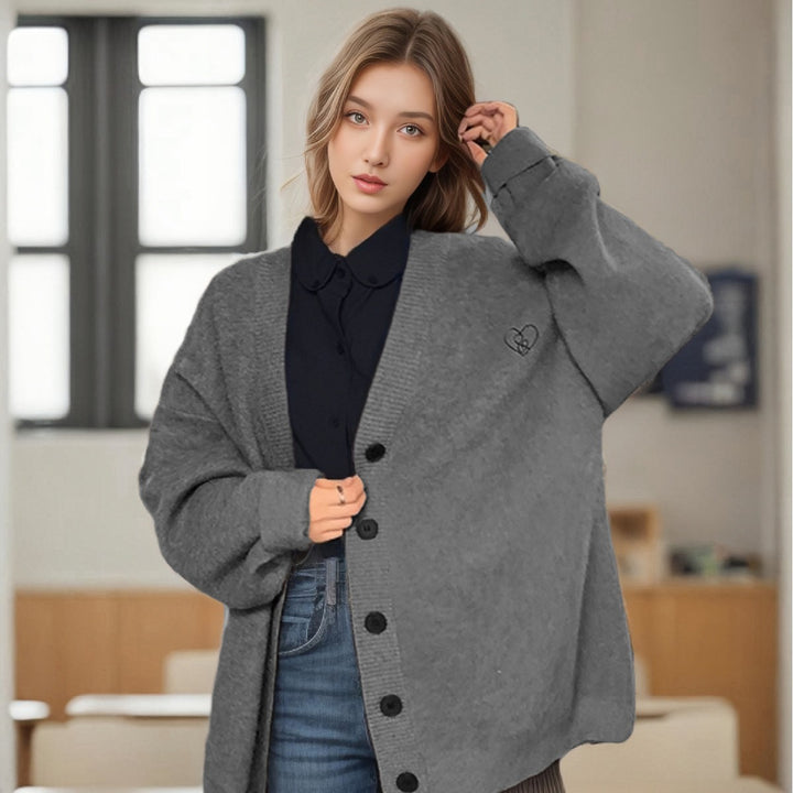Ladies Chunky Knit Cardigan with oversized cut and decorative heart pattern Lune London