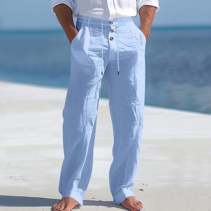 Comfortable beach pants for men with elastic waistband and button closure Lune London