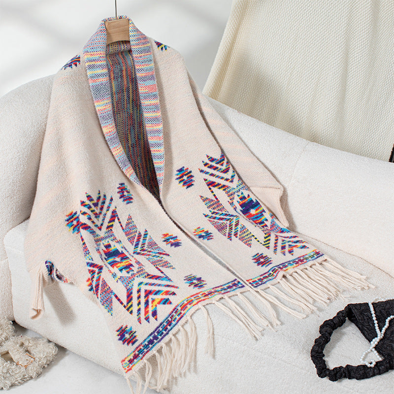 Wool poncho for women with colorful Navajo pattern and fringed hem Lune London