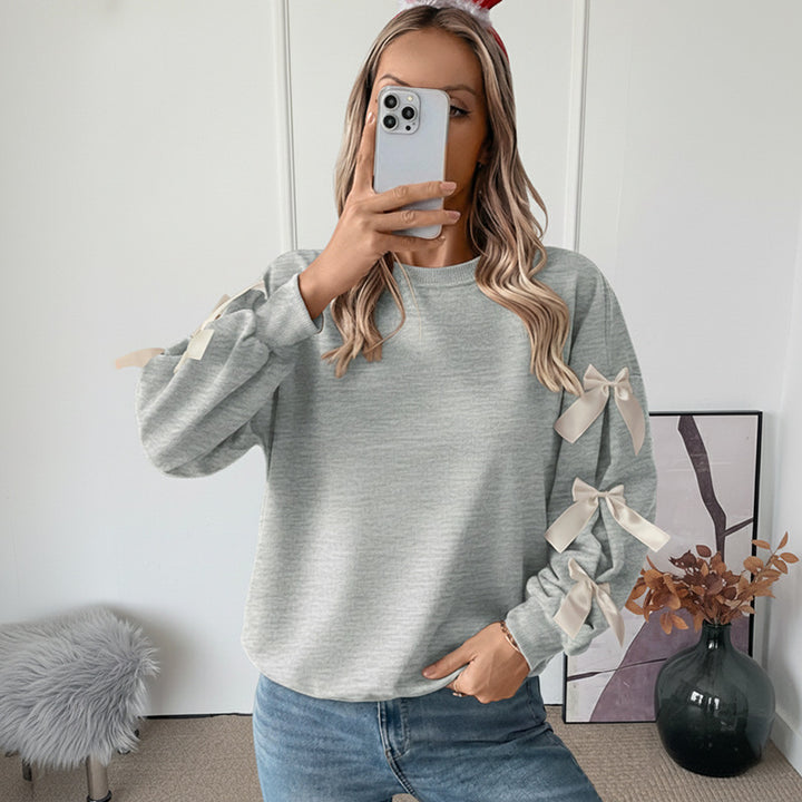 Pull surdimensionné pour femme avec détails de nœud ludiques Chic & Stil