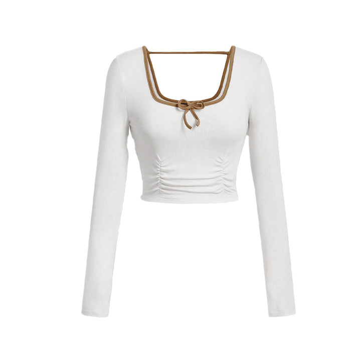 Long sleeve cropped top for women with an elegant square neckline and sophisticated knot details Chic & Stil