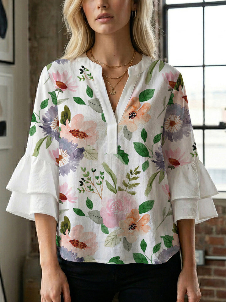 Women's blouse with ruffle details and eye-catching animal print Lune London