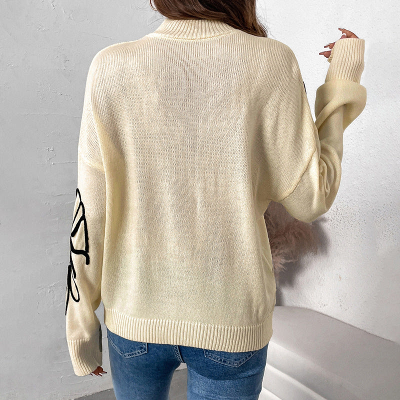 Soft knit sweater for women with floral pattern and high collar Lune London