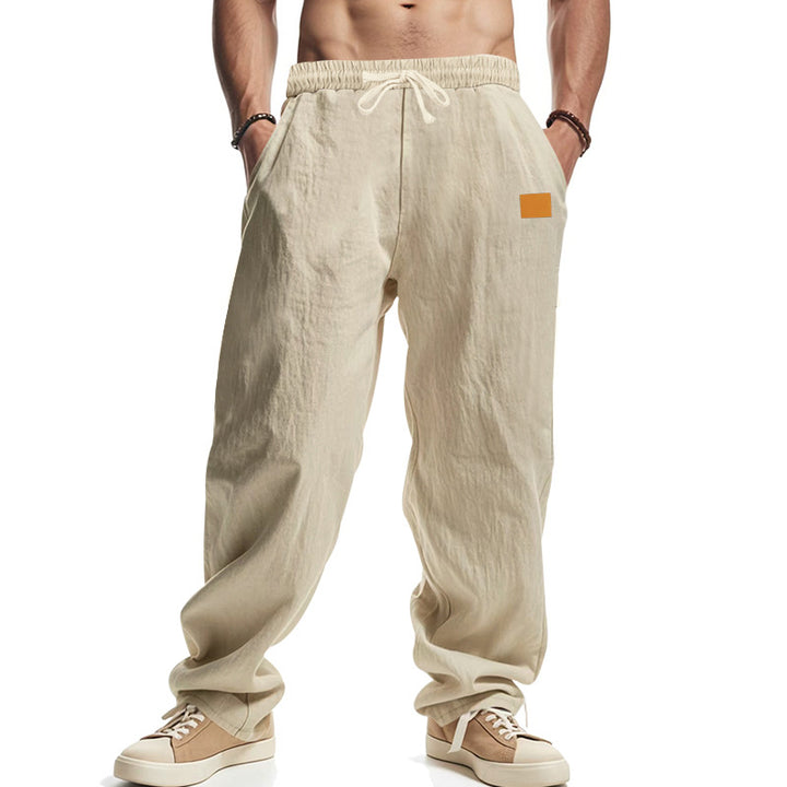 Linen pants for men with a relaxed fit featuring an adjustable drawstring and practical side pockets Lune London