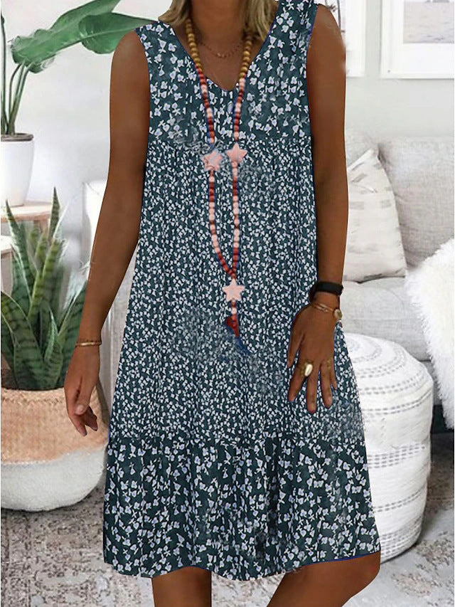 Airy summer dress for women with a playful floral pattern and a fluid silhouette Lune London