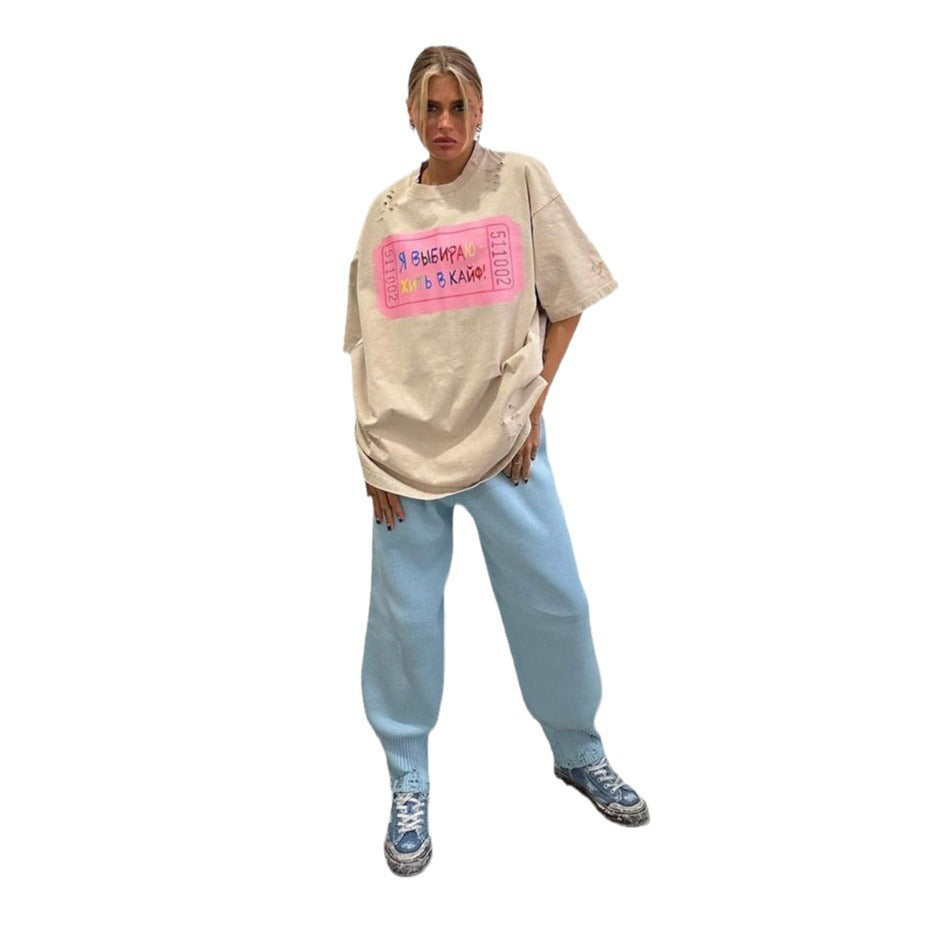 Oversized women's T-shirt with a unique inscription and worn details Lune London