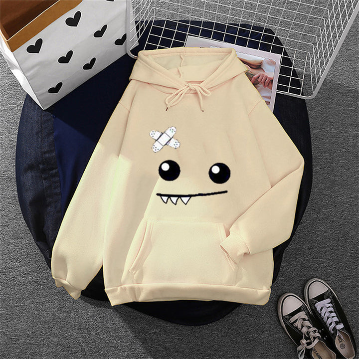 Women's hoodie with playful monster design Chic & Stil