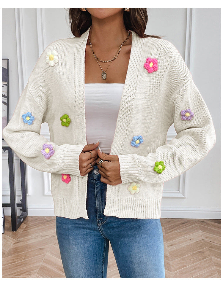 Ladies casual knitted cardigan with colorful flower appliqués Lune London